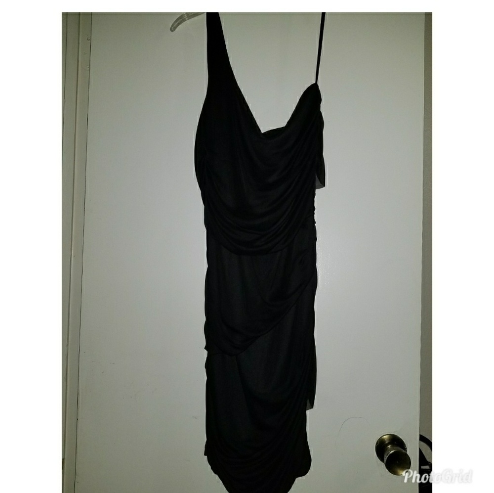 Black chiffon fitted dress.